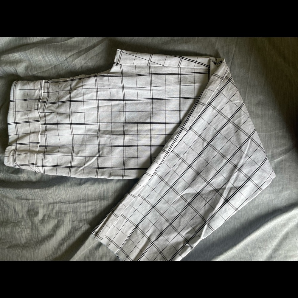 white and black plaid pants